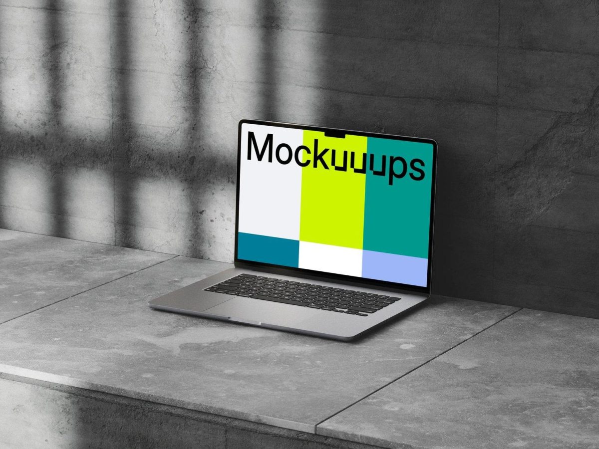Mockuuups Mac Book Air op beton